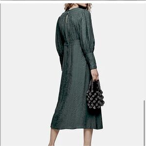 Black long sleeve animal print Dress high neck with back vent slit